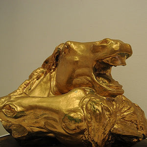 Golden Horsehead statue by Natascha Jusopov 1959, Austria