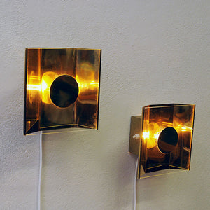 Scandinavian mid-century brass and glass wall lamp pair from the 1960s